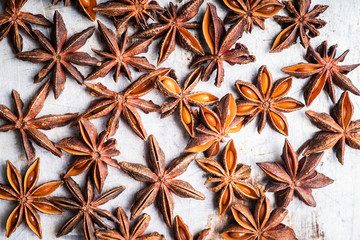 Dried anise stars on the rustic background. Selective focus. Shallow depth of field.