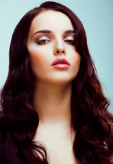 Fototapeta premium young pretty brunette woman with hairstyle waves, luxury look fashion makeup close up