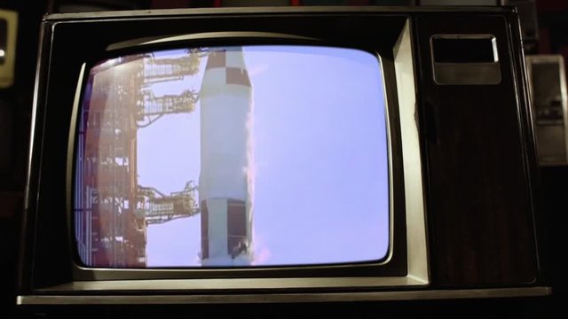 Apollo 11 Rocket Launch in Kennedy Space Center, USA, Jul 16, 1969, on a Retro TV.  Dolly In. Elements of this Video furnished by NASA.  