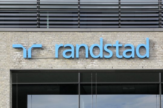 Tilst, Denmark - October 7, 2018: Randstad logo on a wall. Randstad is a Dutch multinational human resource consulting firm headquartered in Diemen, Netherlands