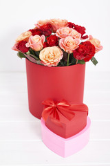 Valentines Day romantic background with flowers roses . Valentine Card with copy space. Flowers in gift box. Valentine's day greeting card template February 14. Happy Birthday or wedding postcard