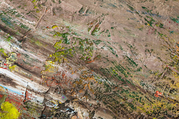 Background image of bright oil-paint palette closeup.