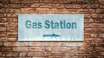 Fototapeta premium Street Sign to Gas Station