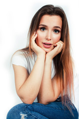 young pretty teenage hipster girl posing emotional happy smiling on white background, lifestyle people concept