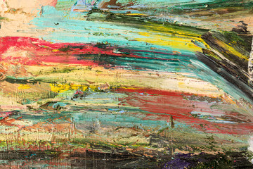 Background image of bright oil-paint palette closeup.