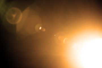 Flash of a distant abstract star. Abstract sun flare. The lens flare is subject to digital...