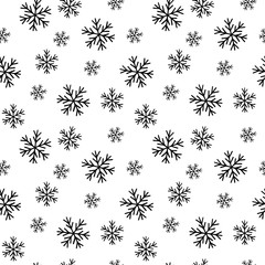 Beautiful hand-drawn snowflakes. Seamless pattern for a festive decoration. Vector.