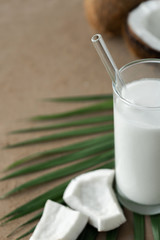 image of fresh half and whole coconuts with coconut non dairy milk