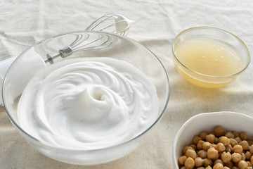 vegan cooking concept, egg replacement ,  whipped chickpeas water (called aquafaba)