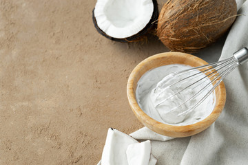 image of coconut cream or butter and coconuts at background