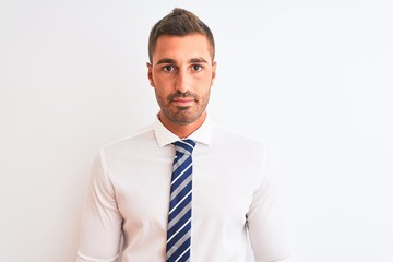 Young handsome elegant business man over isolated background skeptic and nervous, frowning upset because of problem. Negative person.