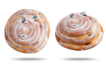  bun with raisins in white glaze. isolated on white background