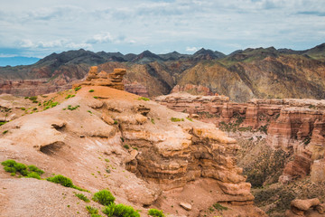 view of the canyon against a cloudy, stormy sky