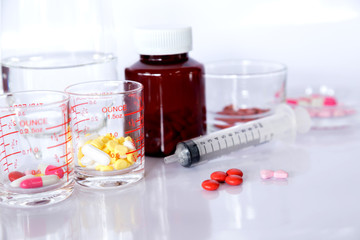 Drug prescription for treatment medication. Pharmaceutical medicament cure in container for health Pharmacy theme, capsule pills with medicine antibiotic in packages..