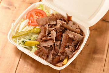 Doner plate to take away in Germany, Turkish fast food in a plastic box