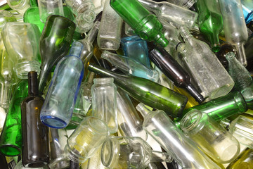 lots of glass bottle, trash