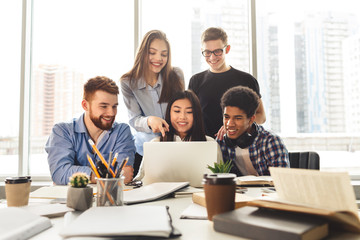 Studying together. Multiethnic students preparing for classes