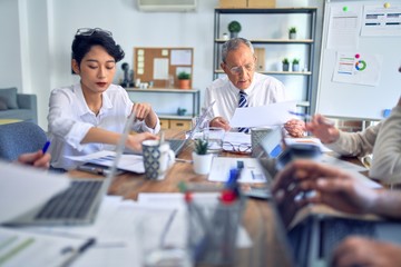 Group of business workers working together at the office