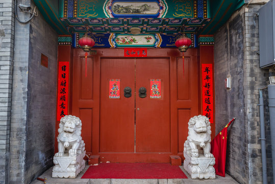 Traditional red door in Beijing, capital city of China