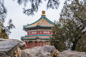 Fototapeta premium Roof of Buddhist Incense tower seen from Longevity Hill in Summer Palace in Beijing, capital city of China