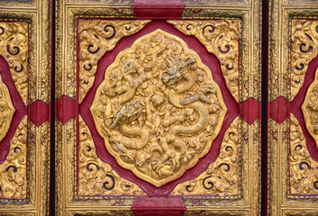 Close up on a door of Hall of Supreme Harmony in Forbidden City, main tourist attraction in Beijing, capital city of China