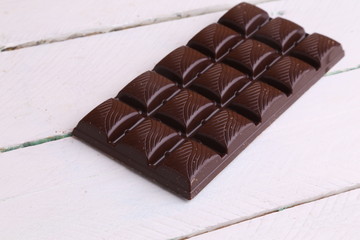 milk chocolate tablet in color background