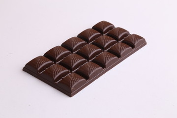 milk chocolate tablet in color background
