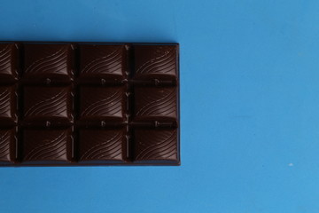 milk chocolate tablet in color background