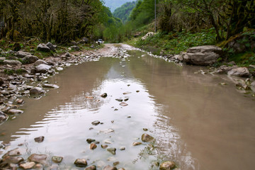Road in the mountains after the rain
