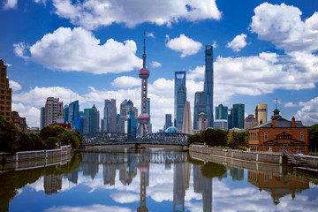 Fototapeta na wymiar Shanghai skyline with historical Waibaidu bridge