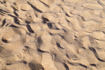 light brown sand on the beach for background