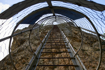Fototapeta na wymiar Ladder to the rock