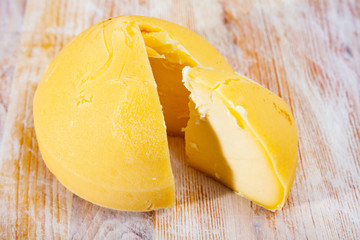 Tetilla cheese with cut slice