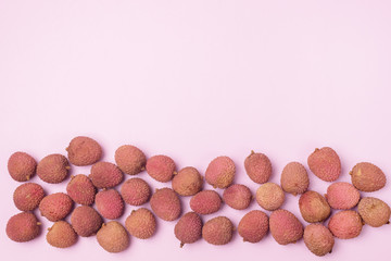 Flat Lay with Fresh and Tasty Lychee on Pink Background Top View Copy Space Organic Tasty Fruits