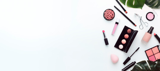 Fototapeta na wymiar Makeup Cosmetics Products And Tools Flat Lay Composition, White Background