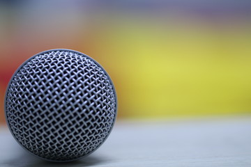 The microphone installed in the auditorium has a beautiful backdrop in the seminar.