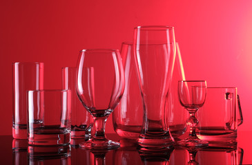 glassware on a red background