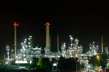 Obraz na płótnie Canvas Oil refinery environmentally friendly, with sky and clouds, river