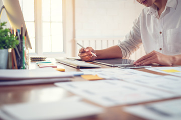 Designer man drawing a website outline and website ux app development on mobile phone.