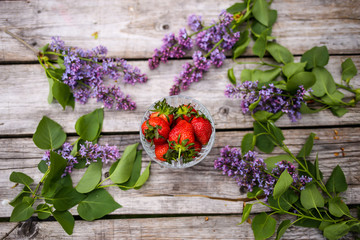 Fototapeta na wymiar Colorful background with flowers and strawberry