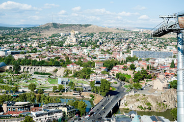 Panoramic view from the cable car of Tbilisi. Old city and modern architecture. Tbilisi, Georgia