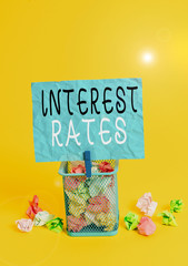 Writing note showing Interest Rates. Business concept for proportion of a loan charged as interest...