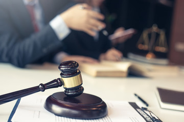 Businessman and lawyer discuss the contract document. Treaty of the law. Sign a contract business.