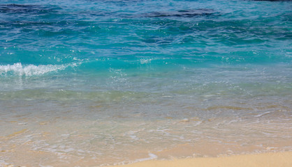 Abstract seascape And Sea Beach and Soft wave of blue ocean. Summer day on the  beach background
