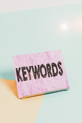 Handwriting text Keywords. Conceptual photo word which acts as the key to a code Concept of great...