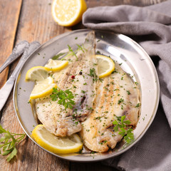 fish fillet with butter and parsley