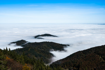 White clouds flowing among mountains; beautiful natural scenery in Freiburg of Germany; shot in November 2019