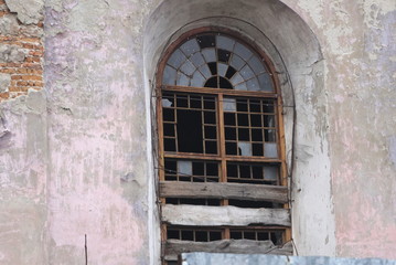 old window with broken glass
