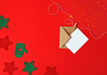 Christmas envelope on the red background.