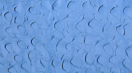 Blue clay plaster walls. Background texture.